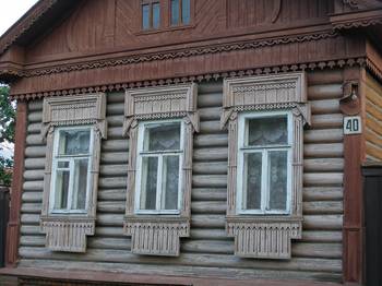 Серый фасад  в деревенском стиле.