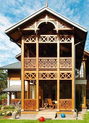 Фото красивого дома коричневого цвета в деревенском стиле