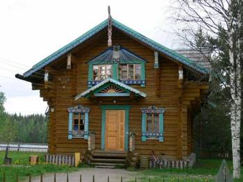 Фотография частного дома коричневого цвета в деревенском стиле