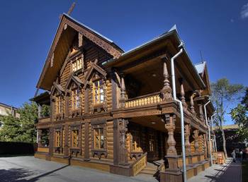 Пример облицовки фасада коричневого цвета в деревенском стиле