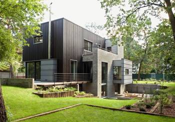 Дизайн кирпичного дома серого цвета