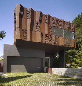 Пример облицовки фасада коричневого цвета в современном стиле