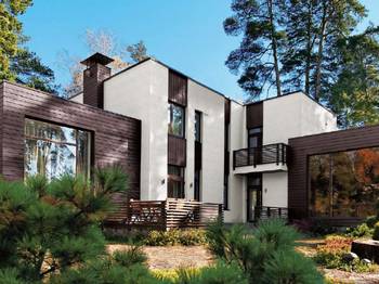 Красивый дом коричневого цвета в современном стиле