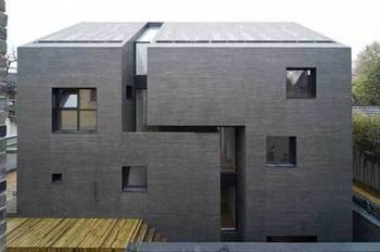 Внешняя отделка бетонного дома в современном стиле