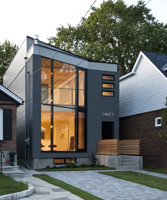 Индивидуальный дизайн фасада серого цвета в современном стиле