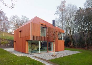 Дизайн дома оранжевого цвета в современном стиле