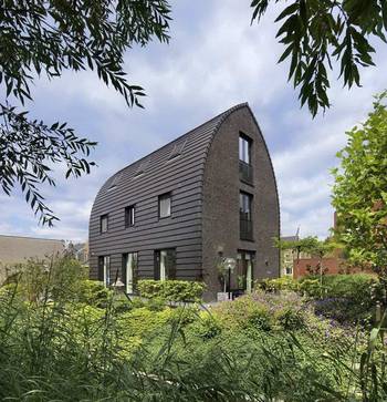 Дизайн фасада дома серого цвета в авторского стиле