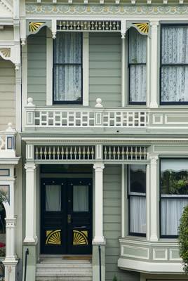 Фото красивого дома бирюзового цвета в викторианском стиле