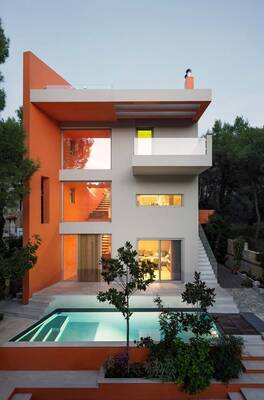 Фото оранжевого дома в современном стиле