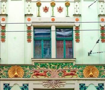 Дизайн фасада дома зеленого цвета в авторского стиле