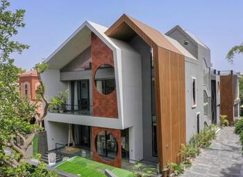 Дизайн дома коричневого цвета в авторского стиле