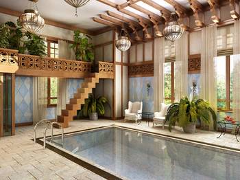 Красивый интерьер бассейна частного дома  в колониальном стиле.